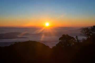Fototapeta na wymiar Mountain Mist in sunrise.