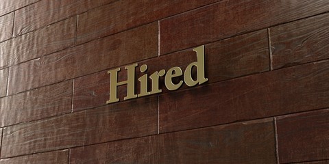Hired - Bronze plaque mounted on maple wood wall  - 3D rendered royalty free stock picture. This image can be used for an online website banner ad or a print postcard.