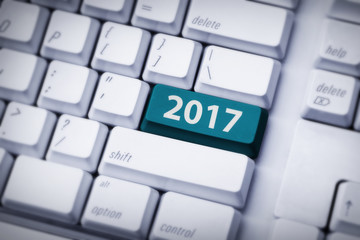 White keyboard with 2017 on the enter key