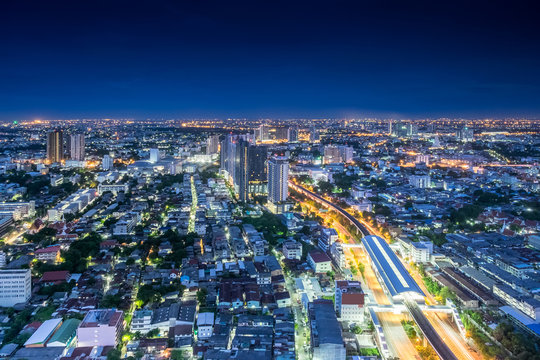 Bangkok at Night, City scape view on metropolis of Thailand and Cloudy blue sky