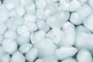 Lumps of snow and ice frazil on the surface of the freezing rive