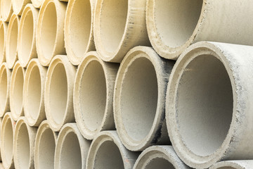 Close up stack of concrete drainage pipes