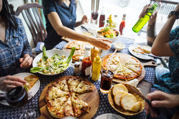 Friends Eating Pizza Party Together Concept