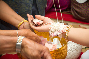.Bride, groom, wedding ring tied arms guests attended the weddin