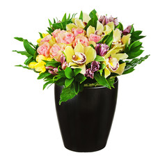 Floral bouquet of roses, lilies and orchids arrangement centerpiece in black vase isolated on white background. Closeup.