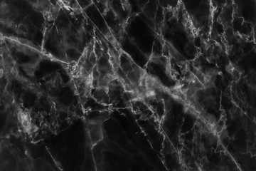 Black marble texture background.