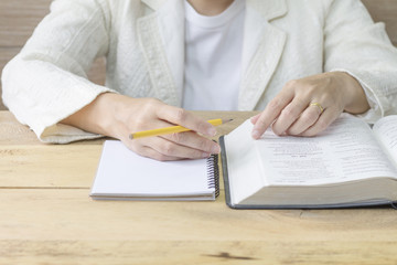  a woman reading the holy bible