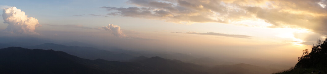 Sunset over the dark cloud view on the mountain,  panorama