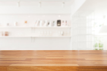 Empty wooden table and modern kitchen background with shelf,