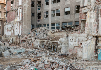closeup of building demolition after earthquake 