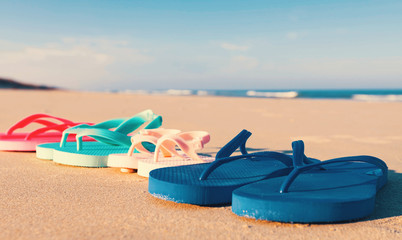 Colorful sandals at the beach