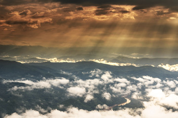 Fantastic Landscape of Sun ray from the sun over the mountain wh