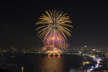 Multicolor fireworks night scene, pattaya cityscape sea beach vi