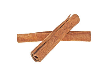 Two cinnamon sticks isolated on white background