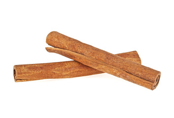 Two cinnamon sticks isolated on white background