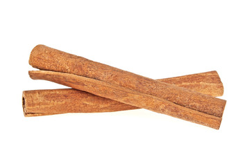 Two cinnamon sticks isolated on white background