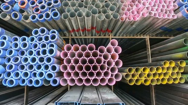 Round metal pipe on shelf for construction