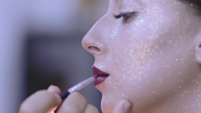 make-up artist doing make-up fashion