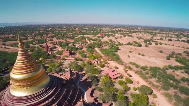 Flying over Dhamma ya zi ka Pagoda and Temples in Bagan, Myanmar (Burma), 4k
