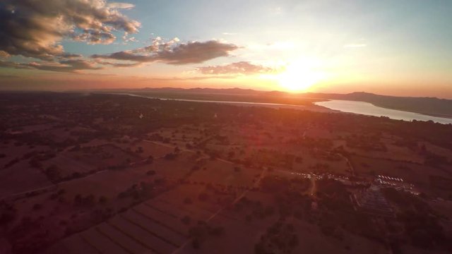 Flying over Temples in Bagan at sunset, Myanmar (Burma), 4k
