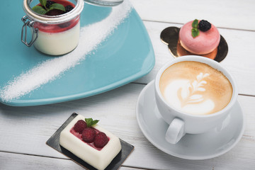 cup of coffee with desserts