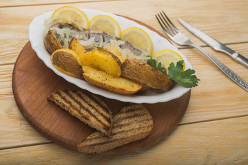 fried potatoes with herring