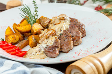 Grilled Steak with potato wedges