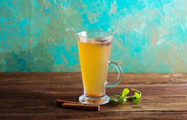 Warm cider. Grog. Mulled white wine on a green background.