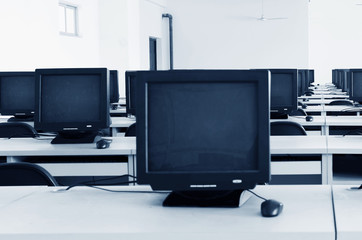 Computer Lab,Neatly placed rows of computer.