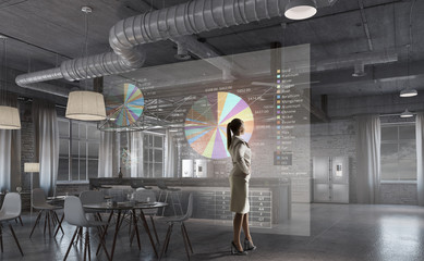 Businesswoman in her office . Mixed media