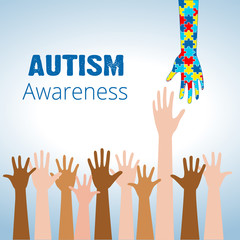 Autism awareness concept with hand of puzzle pieces as symbol of autism.