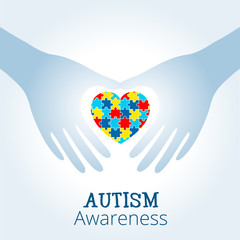 Autism awareness concept with heart of puzzle pieces as symbol of autism.
