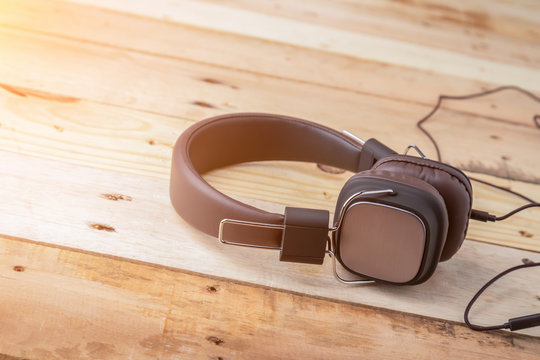 brown vintage style headphone on floor with free copy space for
