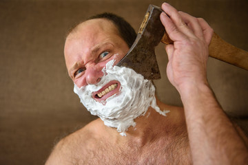 Man shaves with an ax
