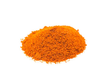 Heap of spice cayenne pepper powder on white background