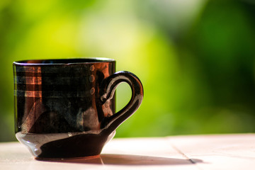 The cup and greenery 