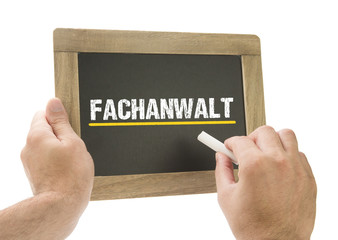 Fachanwalt / Hand schreibt auf Kreidetafel
