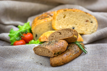 Fresh bread and vegetables  on textiles