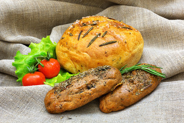 Fresh bread and vegetables  on textiles