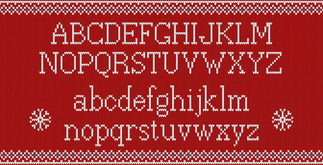 Christmas font. Knitted latin alphabet on seamless knitted pattern with snowflakes and fir. Nordic fair isle knitting, winter holiday sweater design. Vector Illustration.