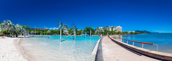 CAIRNS, AUSTRALIA - 27 MARCH 2016. The Esplanade in Cairns with - obrazy, fototapety, plakaty
