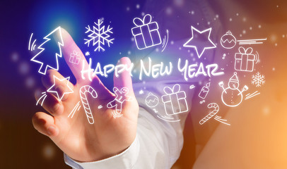 Hand of a man touching interface with happy new year icon around