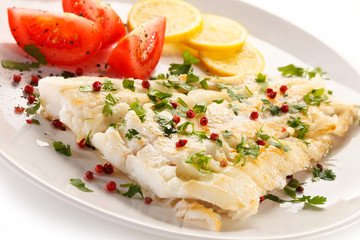 Fish dish - fried fish fillet and vegetables 