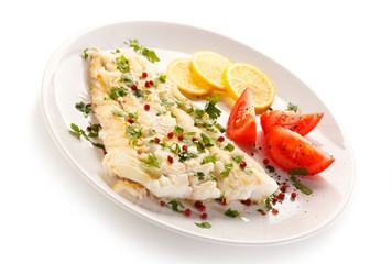 Fish dish - fried fish fillet and vegetables 