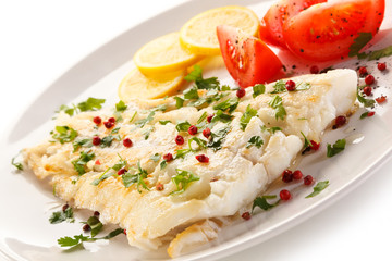 Fish dish - fried fish fillet and vegetables 