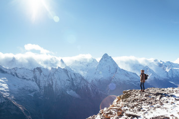 Hiker in mountains in winter