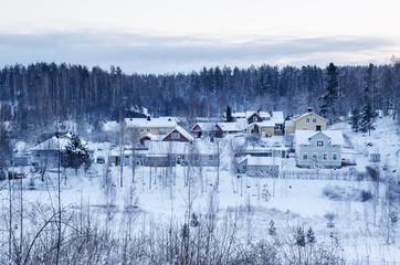 Winter landscape with trees and small swedish town, north scandinavian seasonal hipster background.