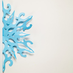 Fine paper snowflake cut out.