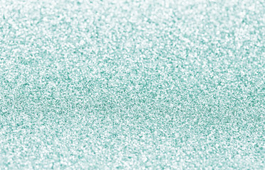 Abstract silver background with glitter and sequins.