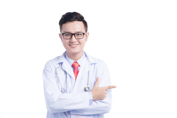 Smiling medical doctor with stethoscope pointing.